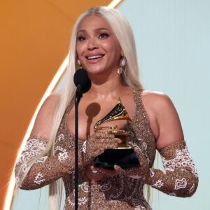 cr_1200x1200-250202192341-Beyonce_accepts_grammy_GettyImages-2197323689_1.jpg